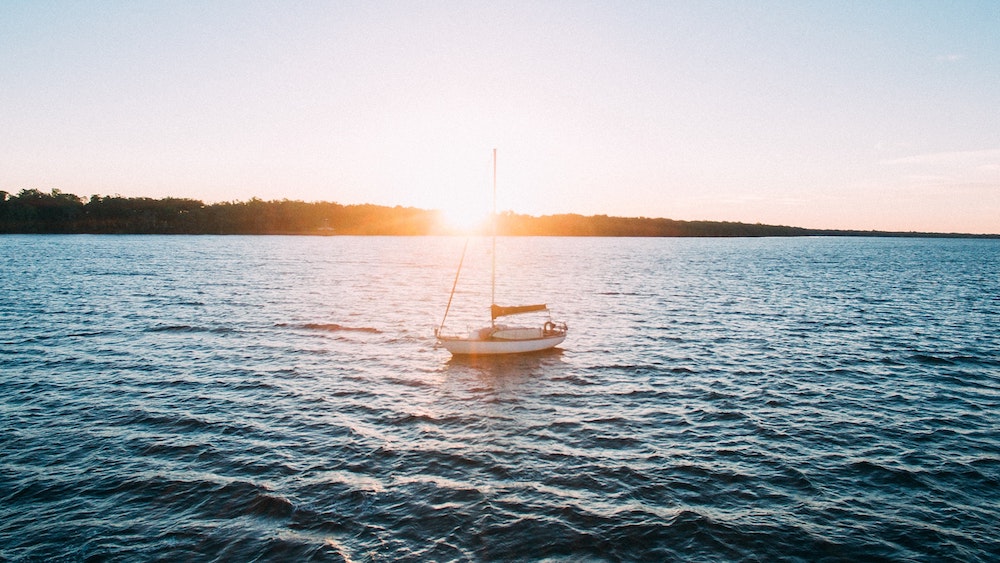 boat floating on calm waters